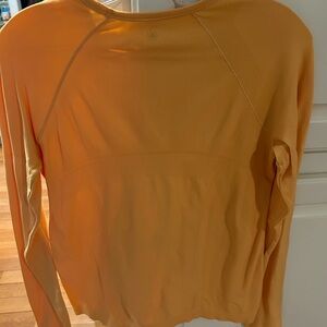 Athleta Girl Orange Fitted Long Sleeve shirt